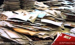 Mailman Arrested After 3 Tons of Undelivered Mail Found in His Backyard